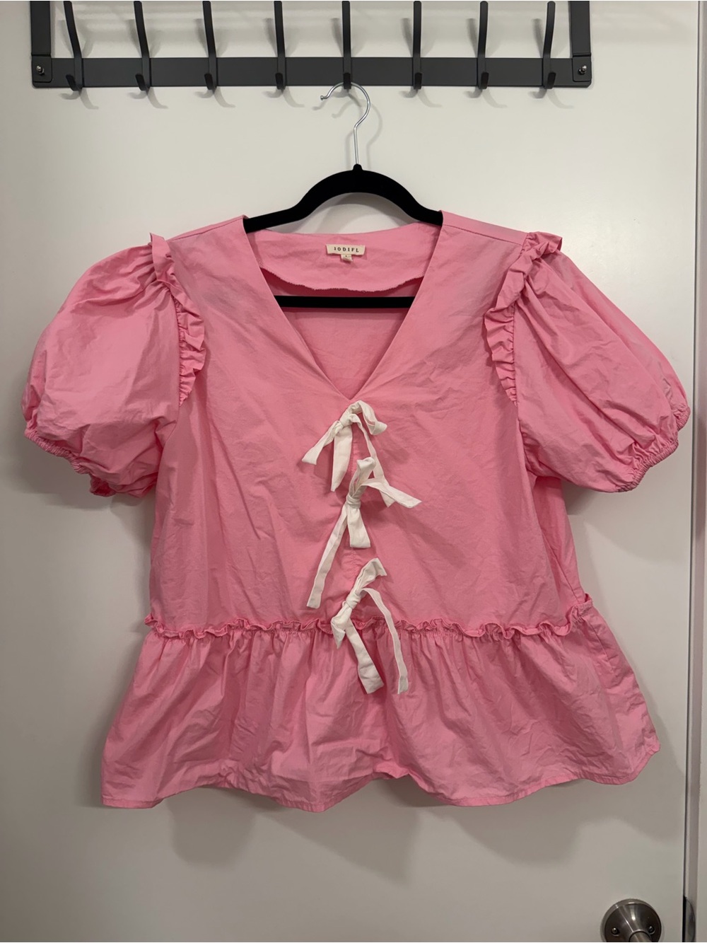 Vintage-Inspired Pink Peplum Tie-Front Top